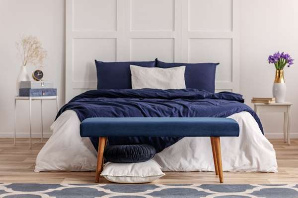 At First Choose white bedding with navy blue