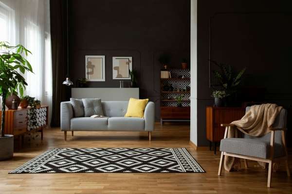 Dark Furniture Against Light Gray Walls