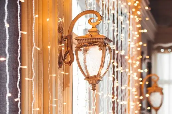 Hang String Lights On The Window Grill In Living Room