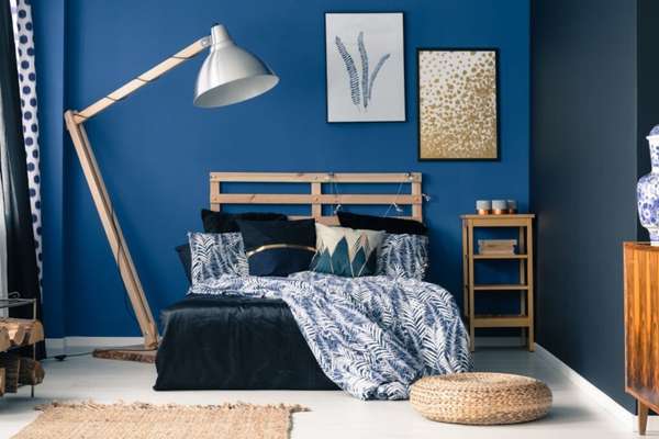 Navy Blue Bedroom With White Lamps