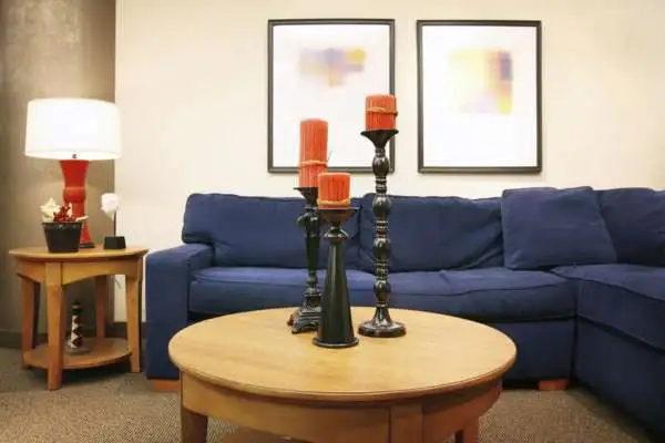 Add Lamps To Decorate A Side Table In A Living Room