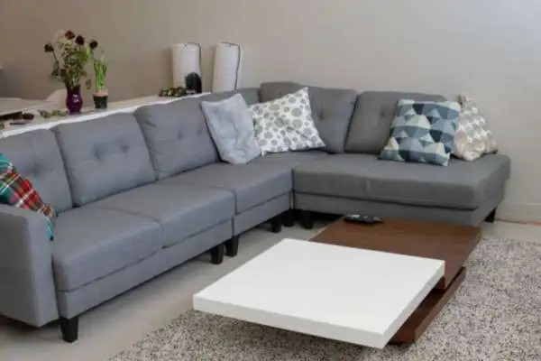 Use An L-Shaped Sectional To Maximize Seating In A Corner