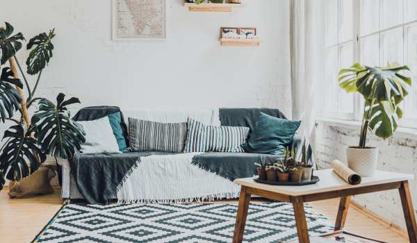 Anchor With Rugs And Accent Pieces Sectional Couch In A Small Living Room